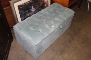 An upholstered ottoman