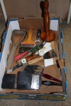 A quantity of decorators brushes and tools