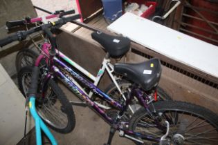A girl's Ammaco Tropical mountain bike with 3 X5 s
