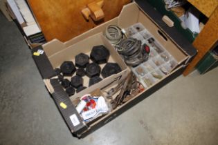 A box of miscellaneous weights, scissors, keys, lo