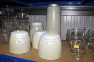 Five James Saddler storage jars