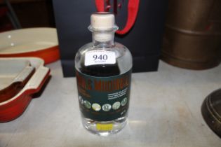 A bottle of Baile Mhoireil gin together with a Rocco Forte carrying bag