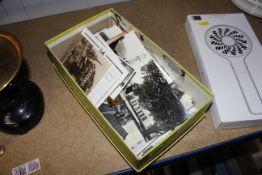 A box of miscellaneous loose postcards and photogr