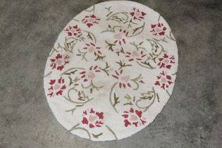 An approx. 3'5" x 2'7" floral patterned oval heart