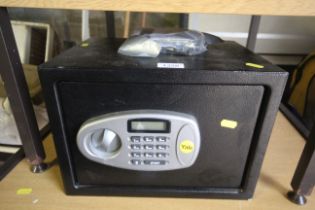 A Yale digital safe with instruction guide, code u