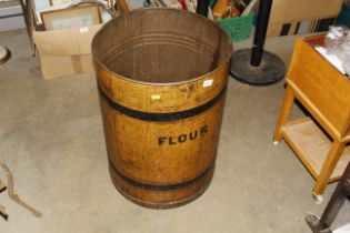 A vintage painted metal flower bin