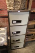 A Sheer Pride metal four drawer filing cabinet lacki