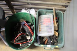 A box containing various hand tools to include a h