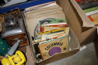 A collection of various 45rpm and 78rpm records