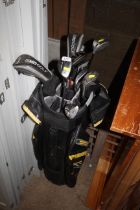 A quantity of golf clubs to include drivers, woods