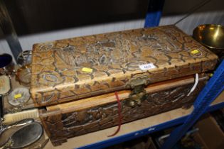A small Oriental carved camphor wood chest and con
