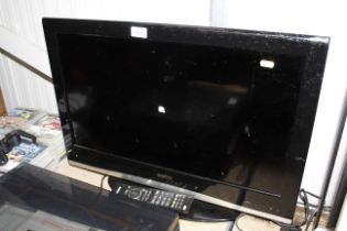 A Sanyo TV with remote control