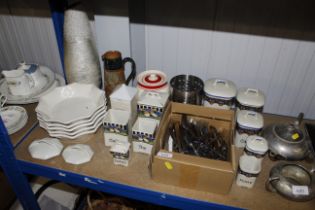 A collection of pottery storage jars, various cutlery, a Doulton jug etc.