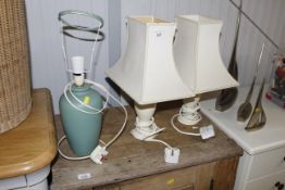 Two onyx table lamps and green pottery similar