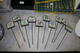 Ten painted cast iron herb markers (181)