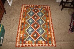 An approx. 4'1" x 2'7" Chobi Kelim rug