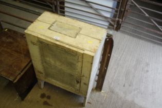 A cream painted wooden meat safe