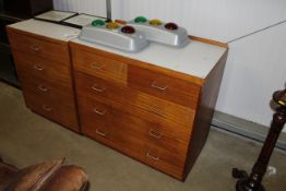 A mid 20th Century Remploy teak chest of drawers with Formica top