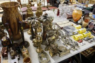 A pair of gilt metal palm tree candlesticks; two g