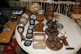 A collection of various wooden ornaments, trophy p