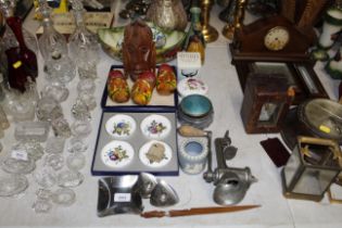 Various assorted ornaments, a mincer, calved mask