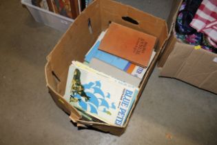A box of miscellaneous books including Blue Peter