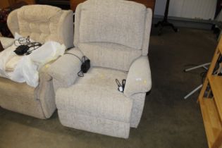 An electric reclining armchair