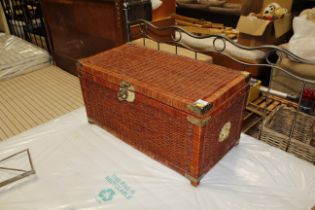 An oriental wicker and brass mounted trunk, an umb
