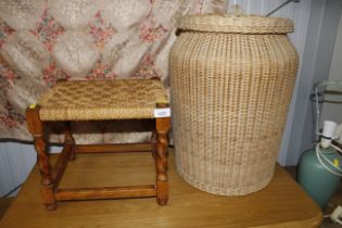 A wicker laundry basket and string seated stall