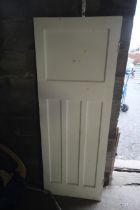 A white painted internal wooden door
