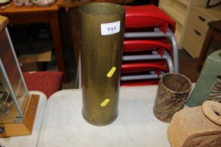 A brass 1945 shell case