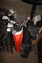 Two golf bags and contents of various golf clubs i
