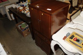 A mahogany Hi-Fi cabinet