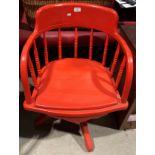 Red painted wooden swivel desk armchair