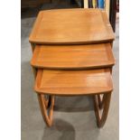 A Nathan nest of three teak coffee tables - small watermarks to top table (Saleroom location S3)