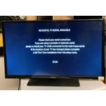A Panasonic TX329302B 32" LED TV complete with remote control