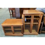 A mahogany finish entertainment cabinet with two glazed doors 53cm x 79cm high and a smaller