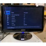 A Samsung Sync Master B2230 HDTV monitor complete with remote control