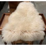 Genuine sheep skin rug approximately 120cm x 80cm (saleroom location: kit area)