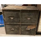 A wood four drawer storage cabinet 66cm x 38cm x 38cm high complete with any contents (saleroom