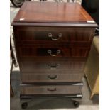 A Charles Sheraton mahogany hi-fi cabinet with single drawer below and cupboard with lift top lid,