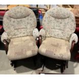 A pair of Dutialier wood framed rocking chairs with non matching cushions.