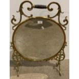 Brass framed fireside mirror,