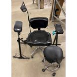 Five assorted tattooist items including chair, arm/leg rest, stool,