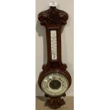 Oak wall hung weather barometer with ceramic face,