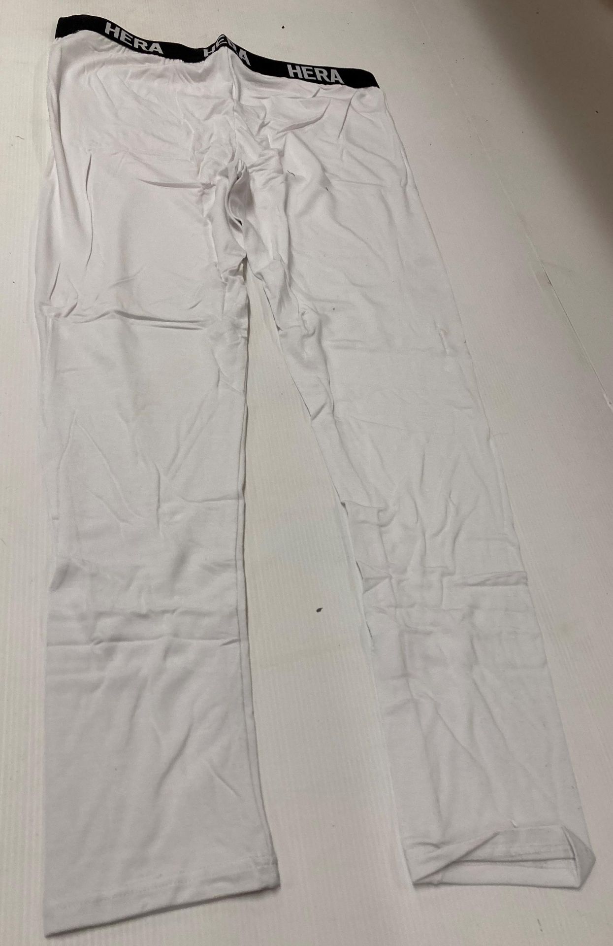A pair of Hera white leggings - size XL (location: S02)