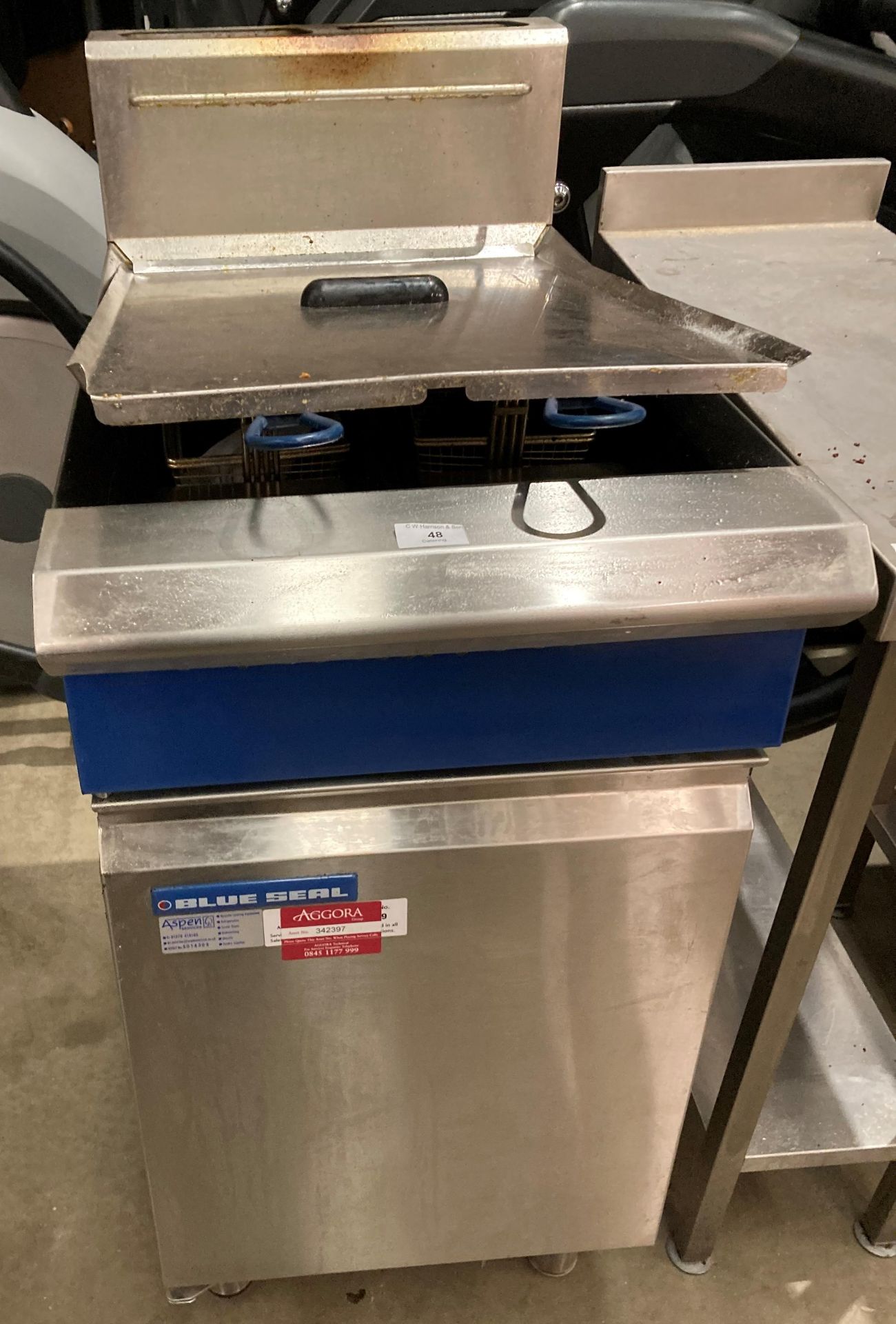 Blue Seal stainless steel gas twin pan deep fat fryer on rear castors complete with two baskets