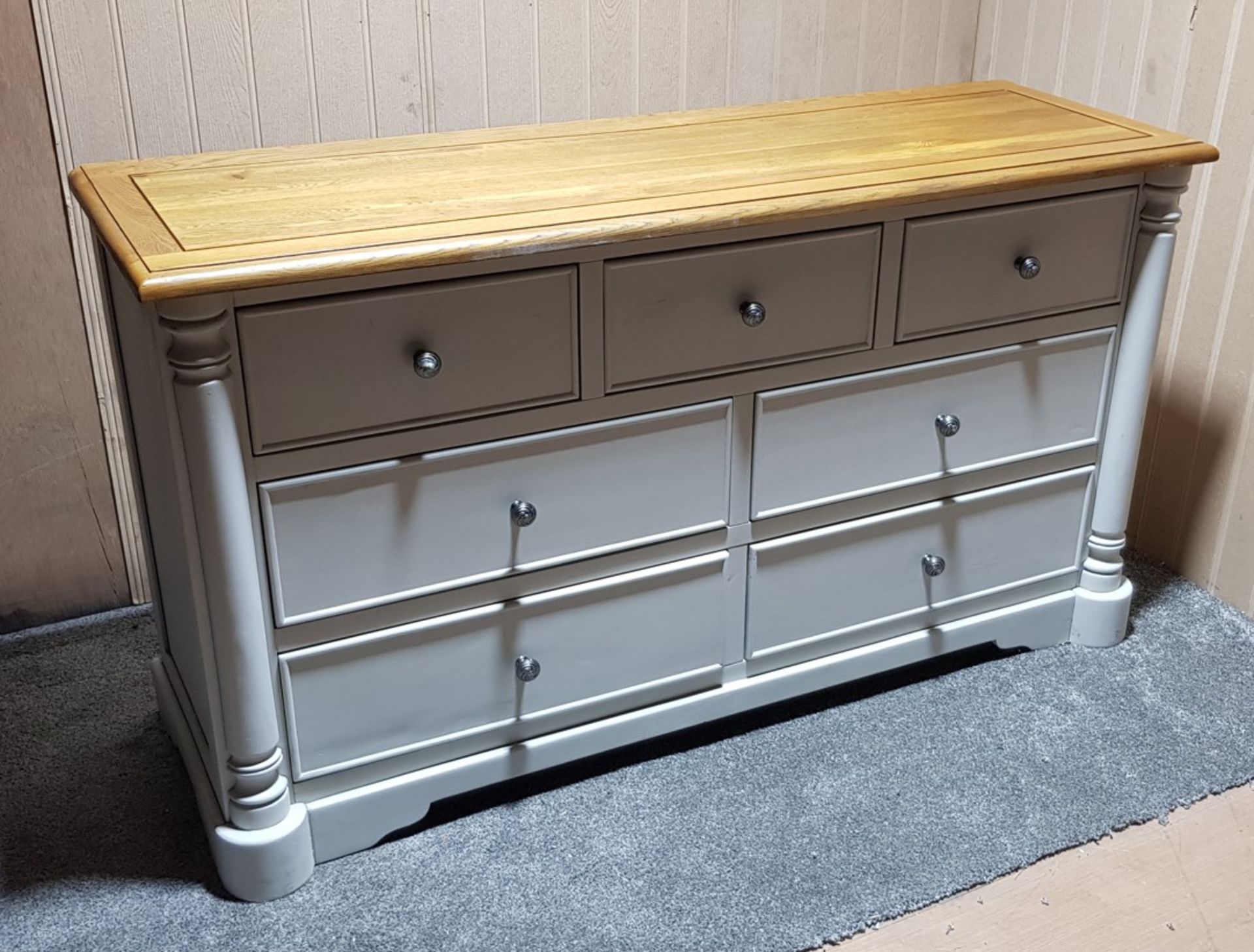 Rustic Natural Oak And Painted 7 Drawer Chest. Dimensions: (H79x W140x D46cm).