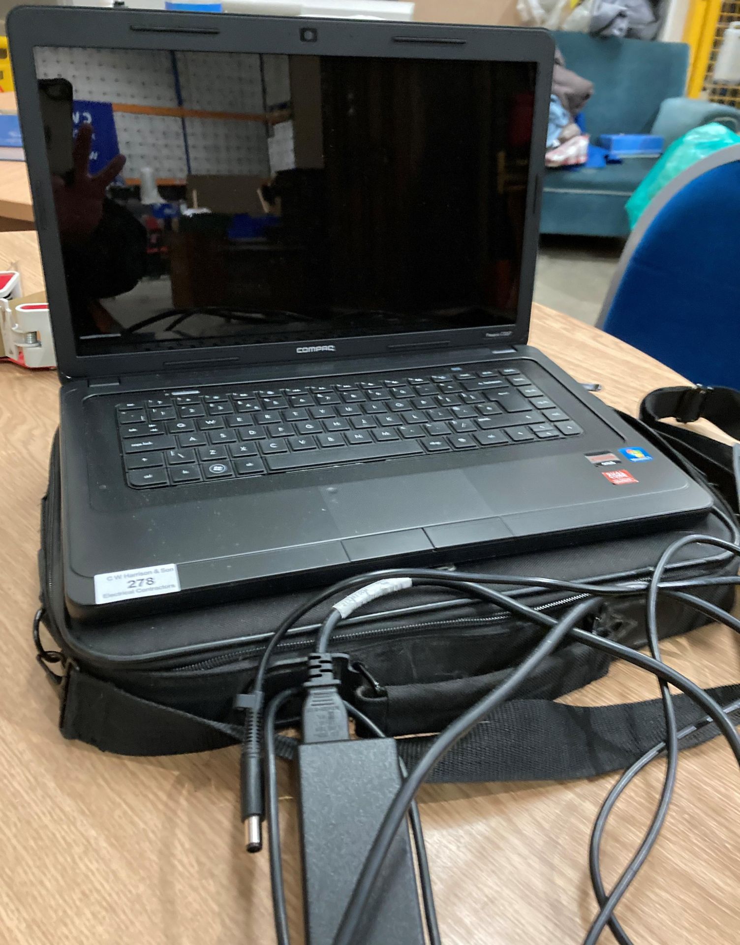 A Compaq Presario C257 laptop AMD E-300 CPU 4HD complete with lead and bag (Saleroom location: Y01)