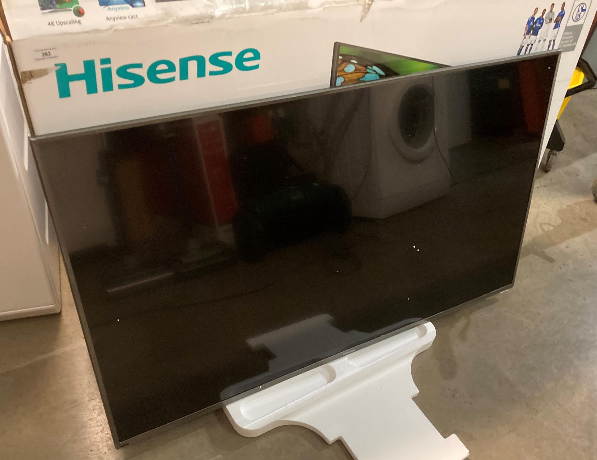 A HiSense 55" panel/monitor - no power lead or remote control but comes with box,